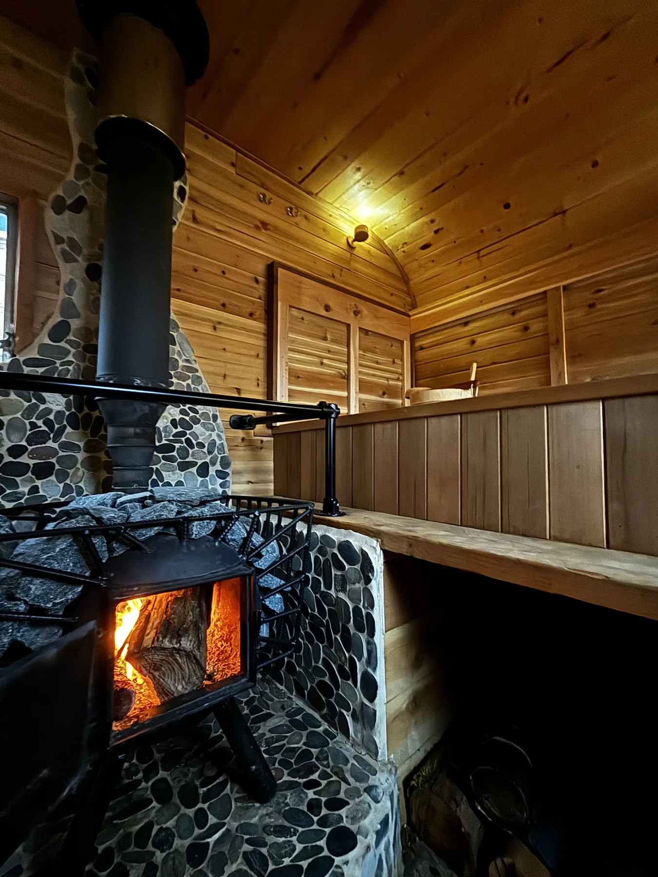 Warm cedar interior of the outdoor sauna